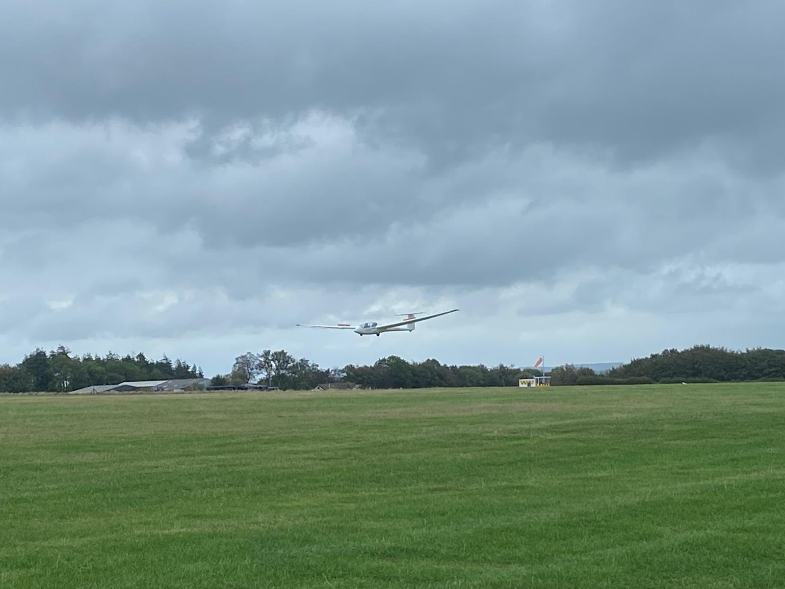 K21 landing with cloudy skies (Charlie Fabb)